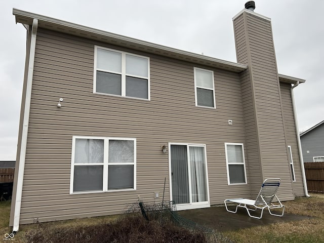 rear view of house featuring a patio