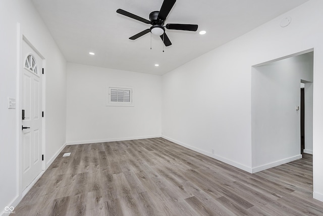 unfurnished room with light hardwood / wood-style floors and ceiling fan