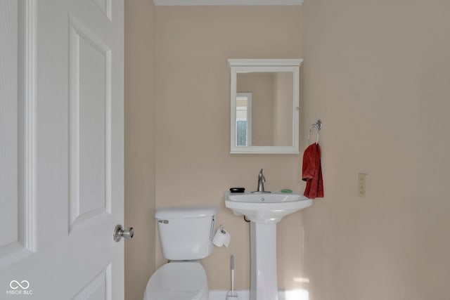 bathroom featuring toilet