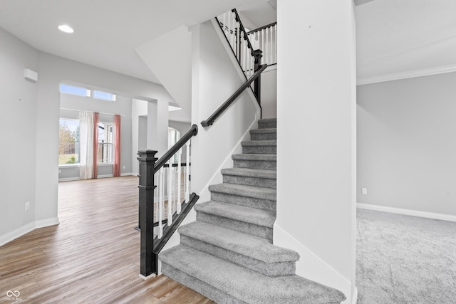 stairway featuring hardwood / wood-style flooring