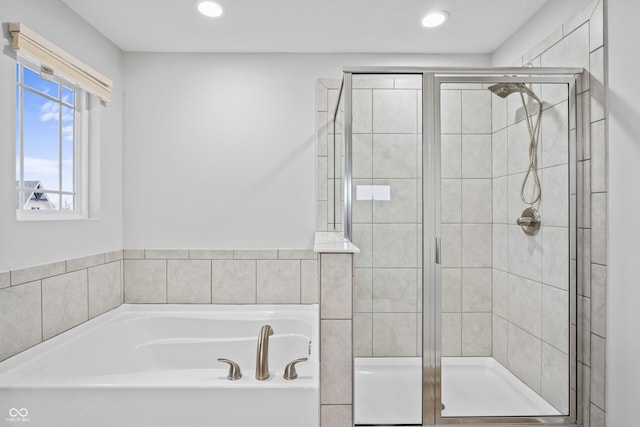 bathroom with independent shower and bath