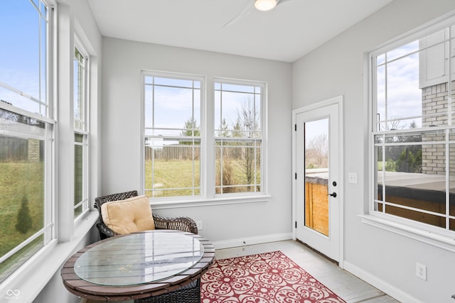 sunroom / solarium with a healthy amount of sunlight