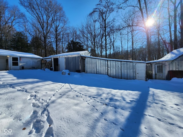 view of yard layered in snow