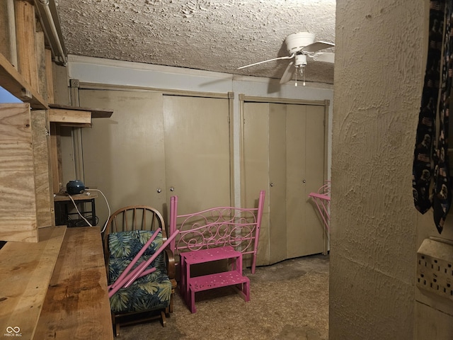 basement featuring ceiling fan