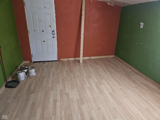 spare room featuring light hardwood / wood-style floors