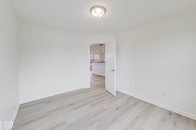 spare room with light hardwood / wood-style floors