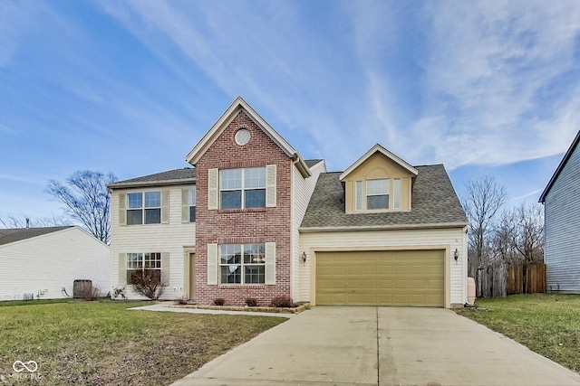 view of front facade with a front yard and a garage