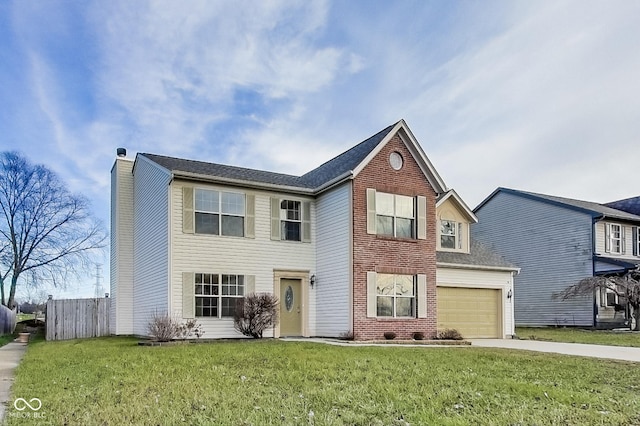 view of front of home featuring a garage and a front yard