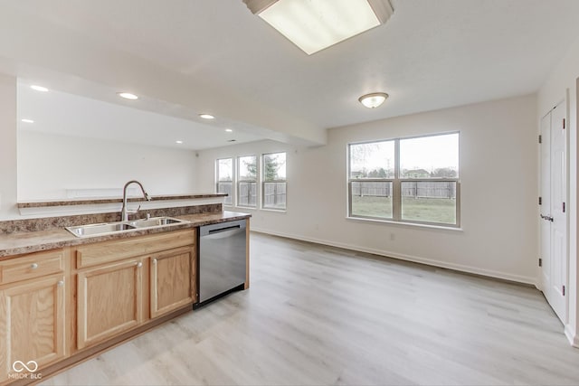 kitchen featuring dishwasher, light brown cabinetry, light hardwood / wood-style flooring, and sink