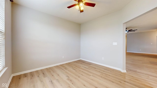 unfurnished room with light hardwood / wood-style floors