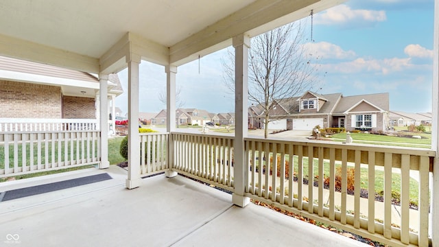 view of patio featuring a porch