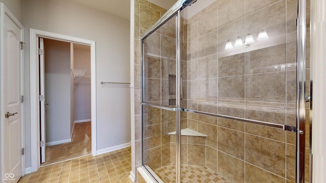 bathroom featuring an enclosed shower