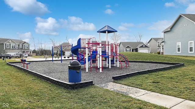 view of playground with a lawn