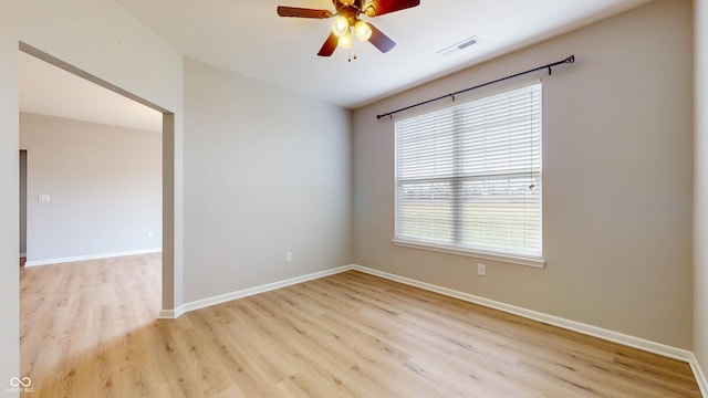 unfurnished room featuring ceiling fan and light hardwood / wood-style floors