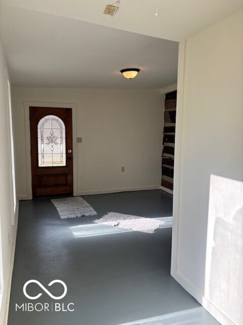 5967 S Lick Creek Rd, Morgantown, IN 46160 - entryway with finished concrete floors and baseboards