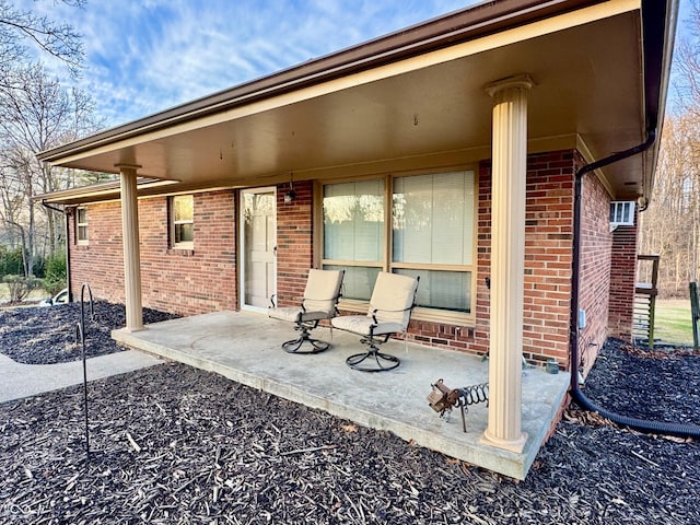 view of patio / terrace featuring a wall unit AC