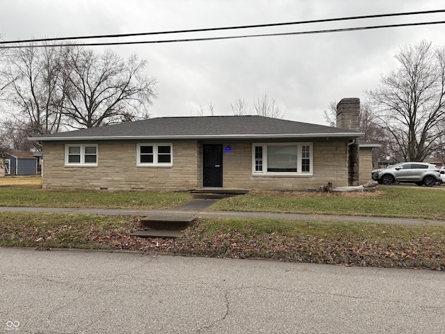 view of front of home featuring a front yard