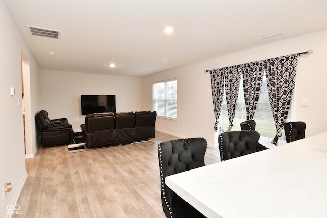 dining space featuring light hardwood / wood-style flooring