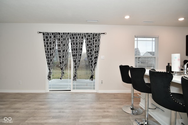 home office featuring hardwood / wood-style floors