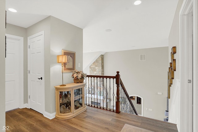 3441 S Overlook Pass, New Palestine, IN 46163 - hall with an upstairs landing, wood finished floors, and recessed lighting