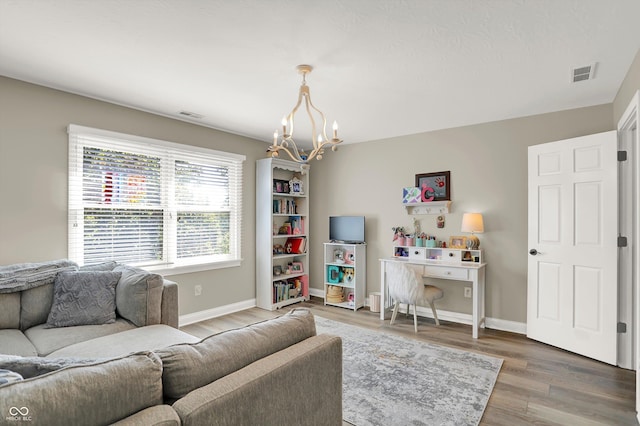 3441 S Overlook Pass, New Palestine, IN 46163 - living area featuring a chandelier and wood finished floors