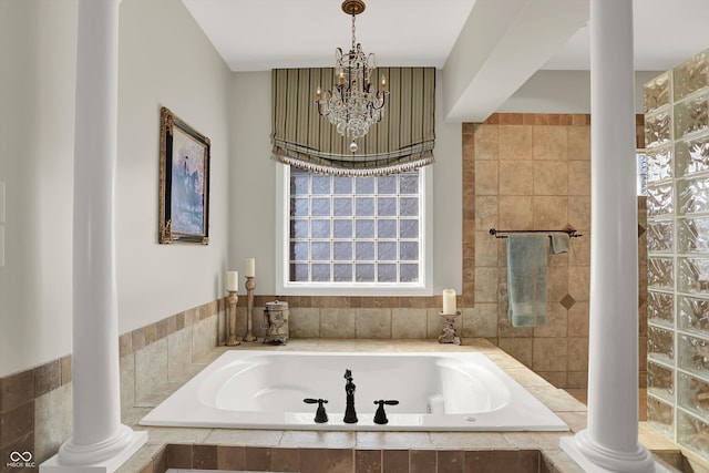3441 S Overlook Pass, New Palestine, IN 46163 - full bathroom with a garden tub, a chandelier, and ornate columns