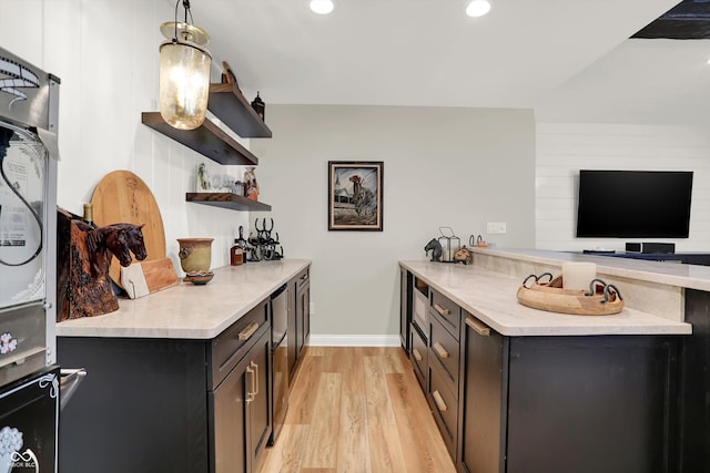 3441 S Overlook Pass, New Palestine, IN 46163 - kitchen with a peninsula, light wood finished floors, light countertops, open shelves, and recessed lighting