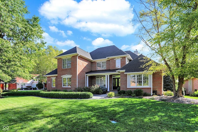 3441 S Overlook Pass, New Palestine, IN 46163 - traditional-style house featuring brick siding, a front lawn, and a chimney