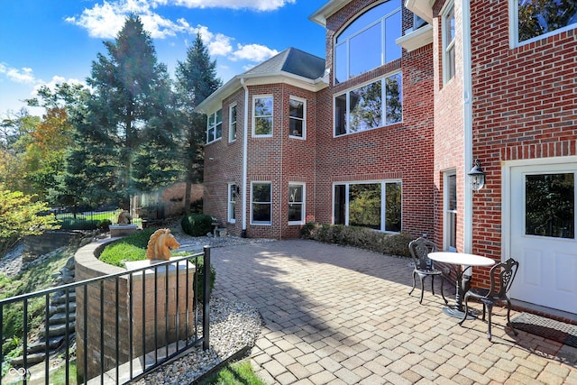 3441 S Overlook Pass, New Palestine, IN 46163 - back of house with brick siding and a patio area