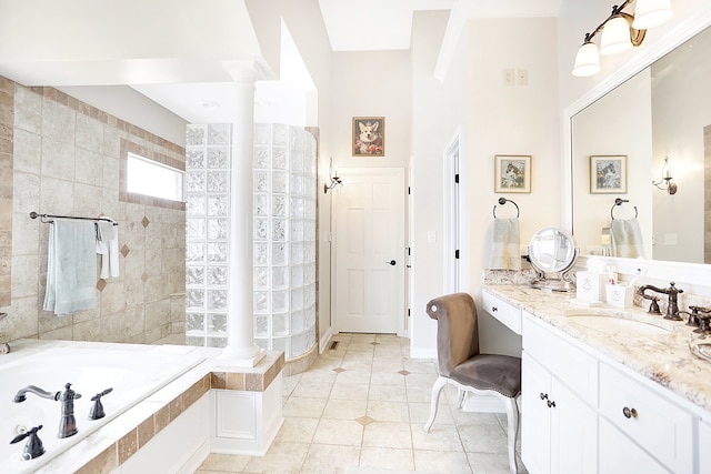 3441 S Overlook Pass, New Palestine, IN 46163 - bathroom with decorative columns, a garden tub, vanity, and walk in shower