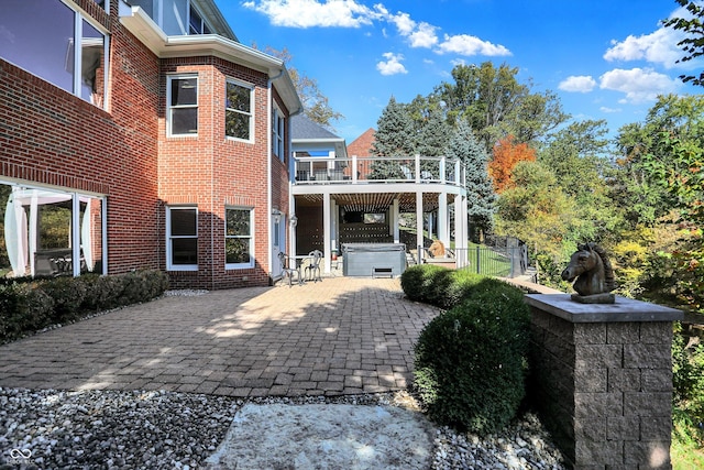 3441 S Overlook Pass, New Palestine, IN 46163 - back of property featuring brick siding, a patio area, and area for grilling