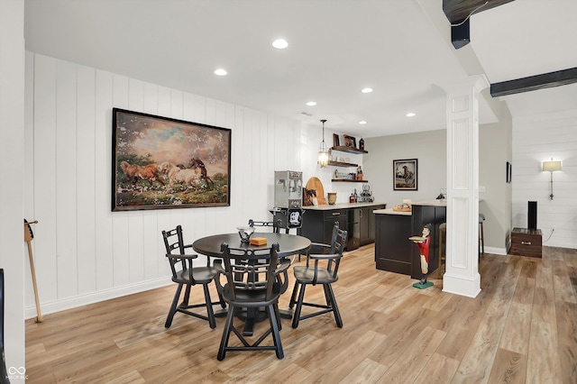 3441 S Overlook Pass, New Palestine, IN 46163 - dining room featuring decorative columns, light wood finished floors, recessed lighting, and a decorative wall