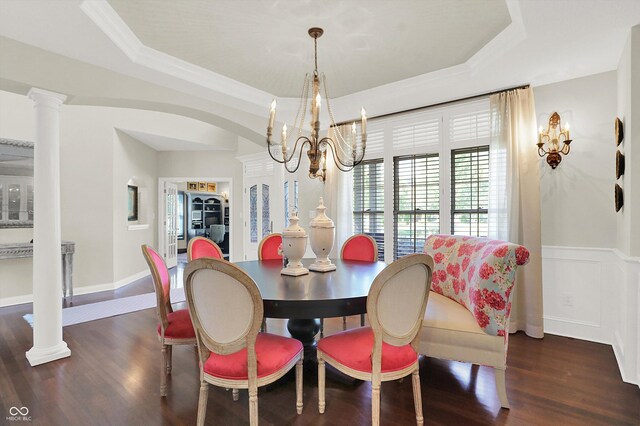 3441 S Overlook Pass, New Palestine, IN 46163 - dining room with a chandelier, a tray ceiling, wood finished floors, ornate columns, and wainscoting