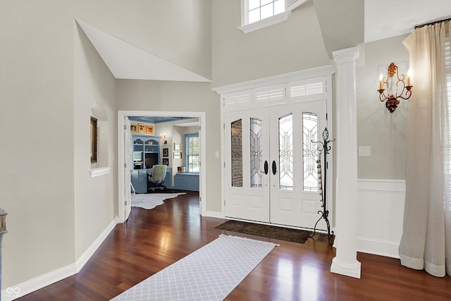 3441 S Overlook Pass, New Palestine, IN 46163 - entrance foyer featuring wood finished floors, ornate columns, and a towering ceiling