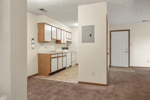 kitchen with white appliances, electric panel, light colored carpet, and sink