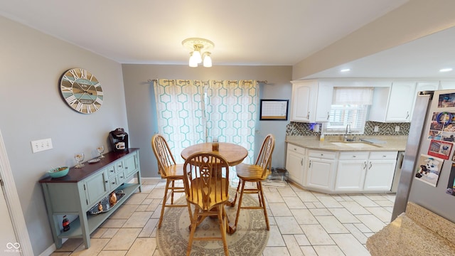 dining room featuring sink