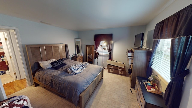 bedroom featuring light hardwood / wood-style flooring