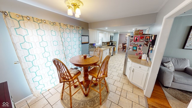 dining room featuring a chandelier