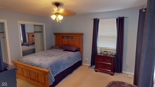 bedroom with light colored carpet and ceiling fan