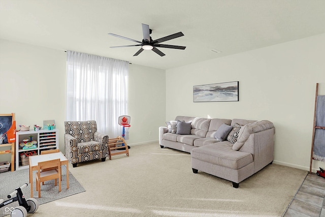 living room with carpet flooring and ceiling fan