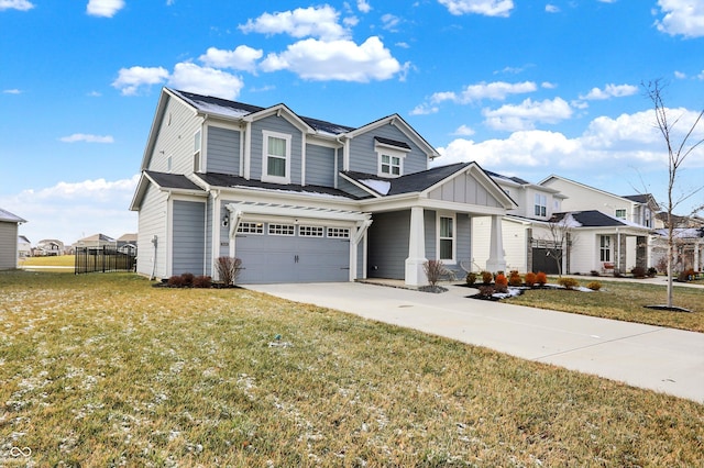 view of front facade with a front yard and a garage