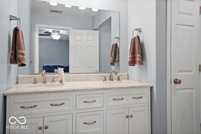 bathroom with vanity and ceiling fan