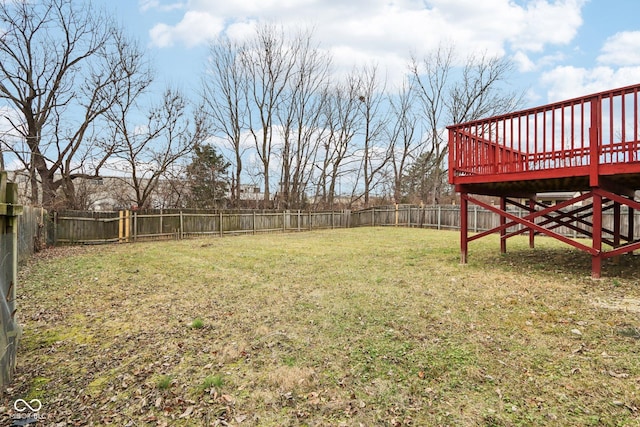 view of yard with a wooden deck