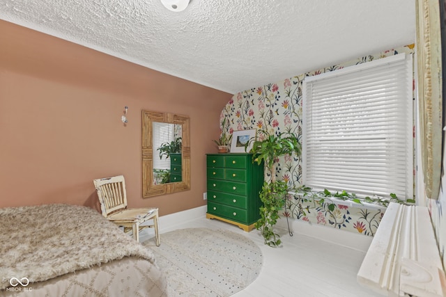 bedroom featuring a textured ceiling