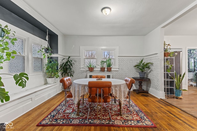 dining space featuring hardwood / wood-style floors