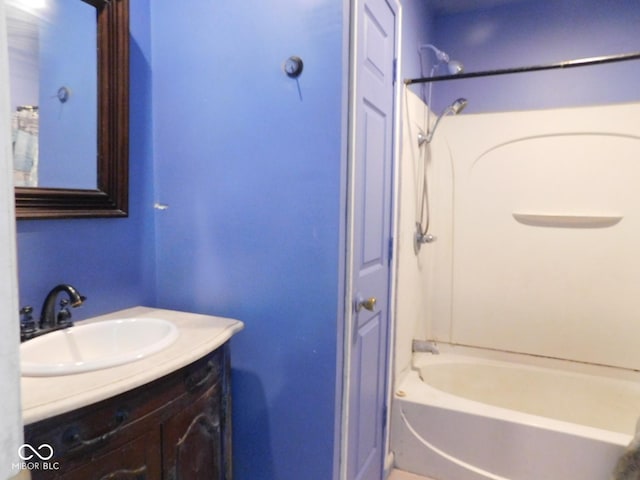 bathroom featuring vanity and bathtub / shower combination