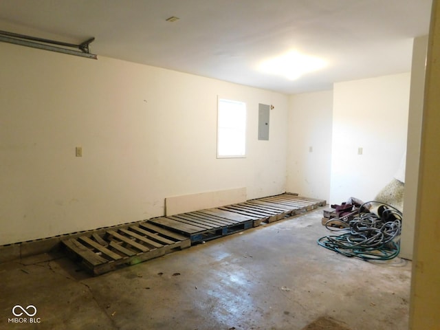 interior space featuring concrete flooring and electric panel