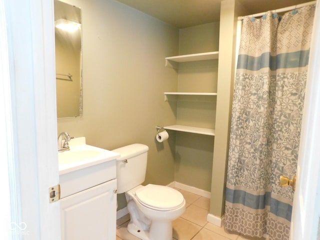 bathroom with vanity, tile patterned floors, toilet, and a shower with shower curtain