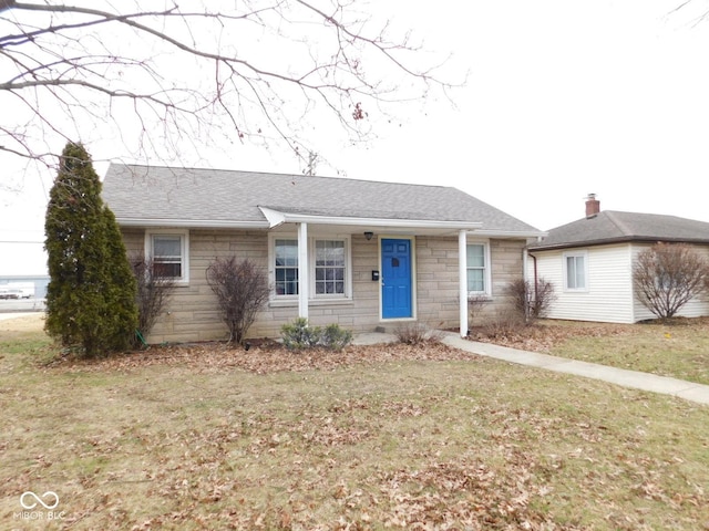 ranch-style house with a front yard