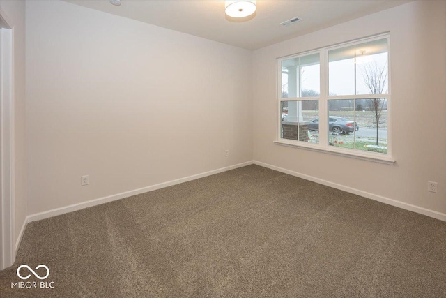 view of carpeted spare room